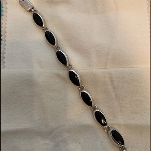 Silver bracelet with Black onyx. Really nice. 7”.